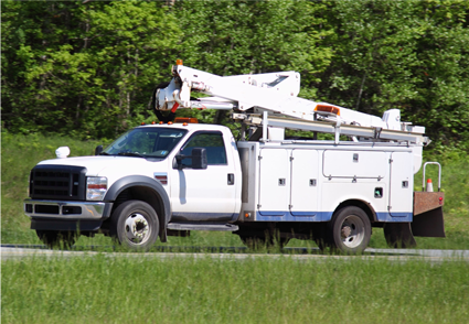 Commercial Work Truck With Cherry Picker Attachment